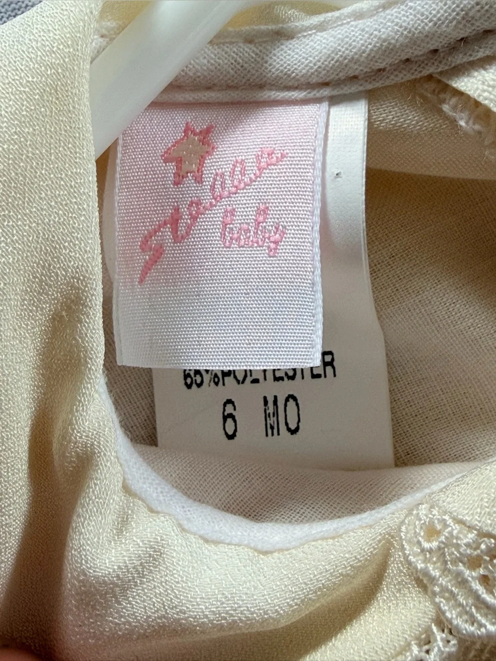 Stellina Baby Cream Smocked Dress with Satin Bow | 6 months